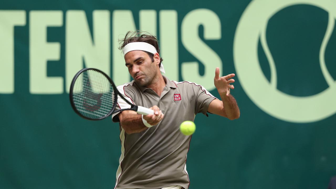 Switzerland's Roger Federer overcame a stern test from John Millman in Halle. (Photo by Friso Gentsch/dpa/AFP)