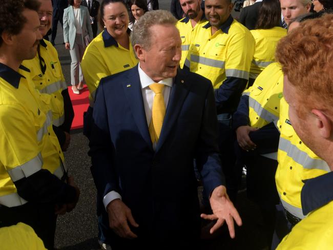 PERTH, AUSTRALIA _Newswire photos JUNE 18 2024.Premier Li  visits Fortestcue in Hazelmere. With Andrew "Twiggy" Forrest showing him around the work shop.Dr Forrest signs a workers shirt. Meeting the Fortescue workers.Picture NCA Newswire /  Sharon Smith