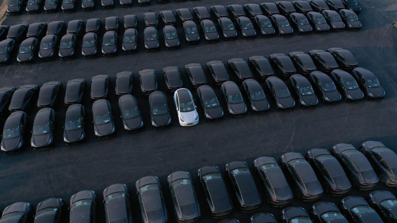 Tesla Model Y electric cars stand at the new Tesla Gigafactory electric car manufacturing plant near Gruenheide, Germany. (Photo by Sean Gallup/Getty Images)