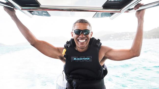 Barack Obama during a kitesurfing session with billionaire Richard Branson, off the coast of Moskito Island in the British Virgin Islands in the Caribbean in 2017. Picture: AFP