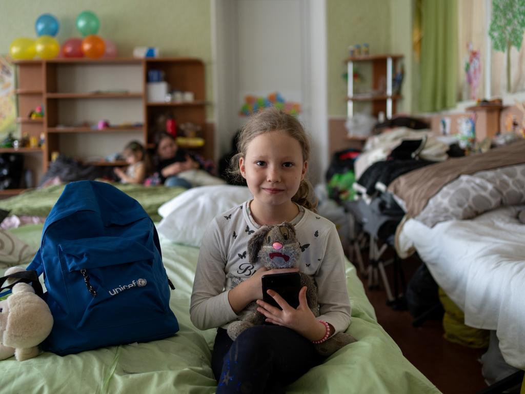 KIDS NEWS. Ukrainian children share the precious toy they took with them as they fled their homes for safety. This is Alyona and Motya the rabbit. Picture: OLEKSII FILIPPOV/ UNICEF