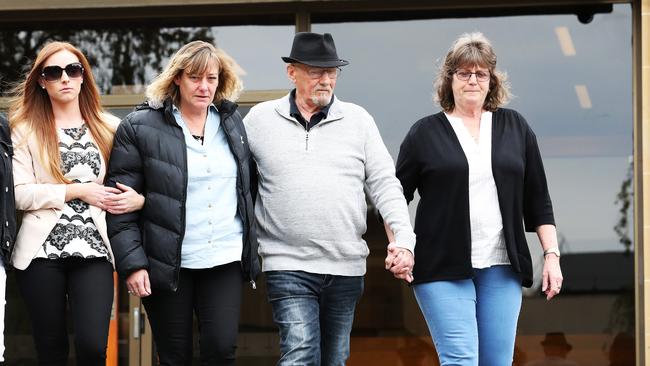 From left, Dwayne Davies’ niece Danielle Lush, sister Kelly Goss, father Glen Davies and stepmother Karen Davies leave the Supreme Court in Hobart.