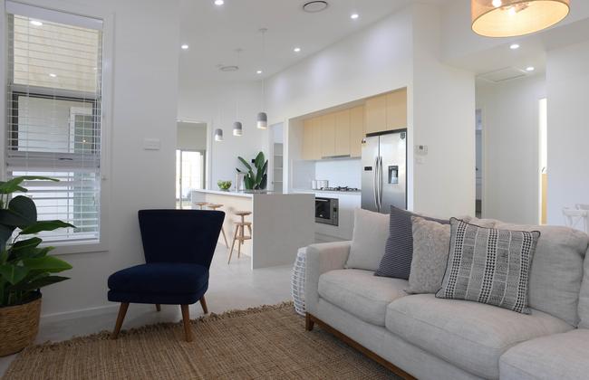 The central lounge/family room opens onto the kitchen.