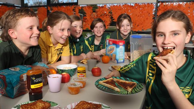 Breakfast clubbers Jesse, Tamsyn, Bella, Aiden, Tilly and Lily. Leopold Primary School Breakfast Club runs 5 days a week and is attended by up to 120 students per day, some of whom would otherwise go hungry. Picture: Alan Barber