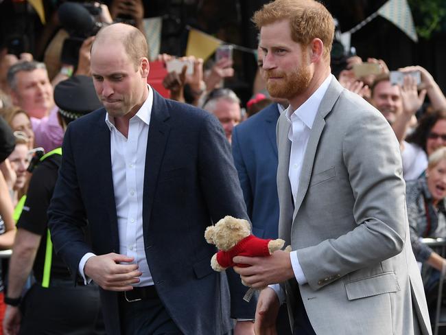 Prince Harry and Prince William greet the crowds near Windsor Castle in a final appearance the day before the royal wedding. Picture: Shaun Botterill/Getty Images