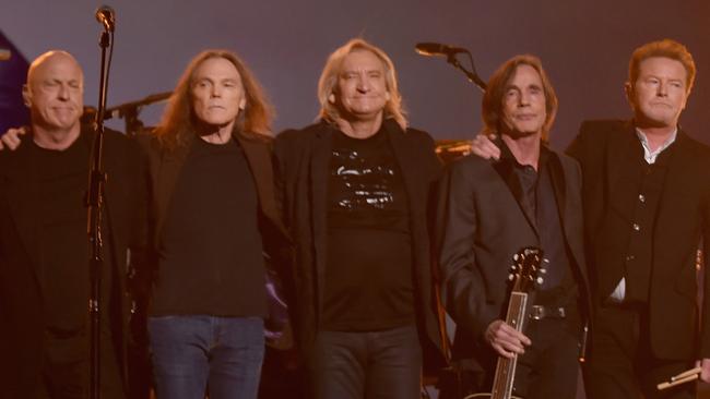 (L-R) Musicians Bernie Leadon, Timothy B. Schmit, Joe Walsh, Jackson Browne and Don Henley, paying tribute to Eagles founder Glenn Frey, appear onstage during The 58th Grammy Awards. Picture: Getty