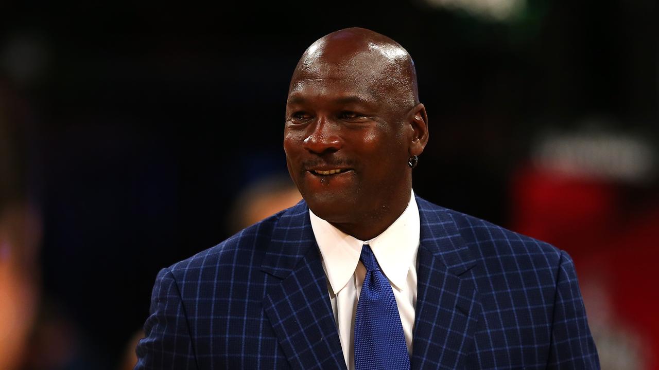 Michael Jordan of the Eastern Conference All Stars smiles during