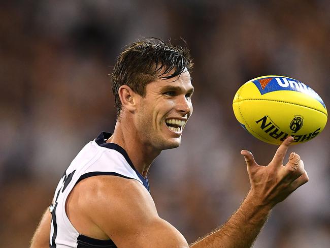 MELBOURNE, AUSTRALIA - MARCH 22: Tom Hawkins of the Cats celebrates winning the round one AFL match between the Collingwood Magpies and the Geelong Cats at Melbourne Cricket Ground on March 22, 2019 in Melbourne, Australia. (Photo by Quinn Rooney/Getty Images)