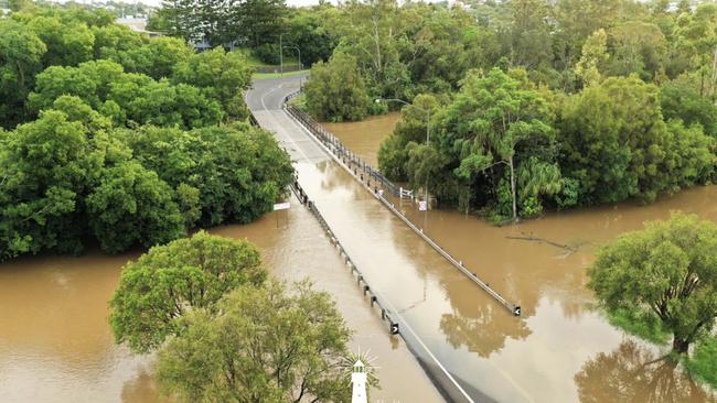 The Mary River at Kidd Bridge Gympie goes under in late 2024 due to flash flooding from heavy rain. Photo: Infinity Flights Photography