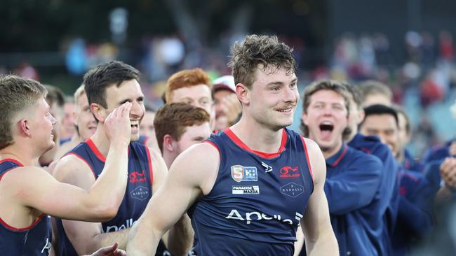 Harry Boyd from Norwood is congratulated by teammates after winning the Jack Oatey Medal. tPicture: David Mariuz