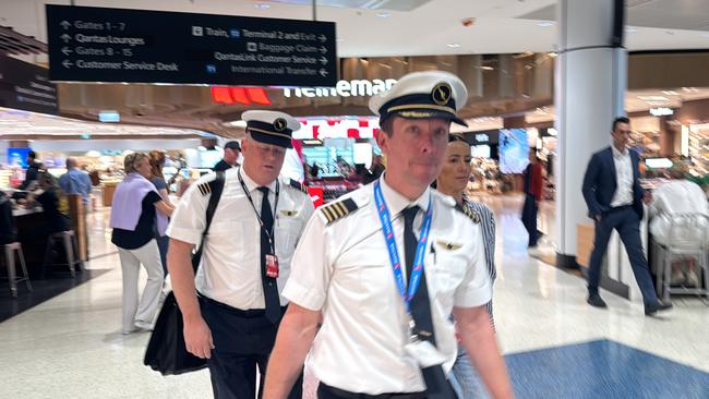 The Qantas pilots after the emergency at Sydney Airport. Picture: Liam Mendes