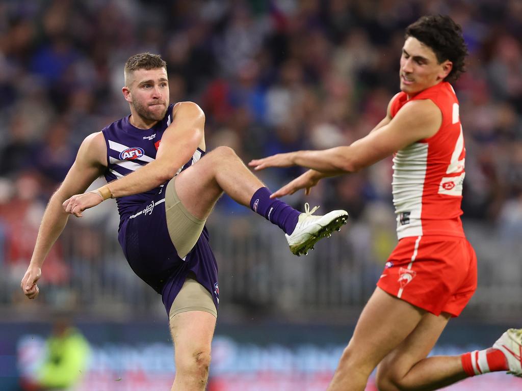 PERTH, AUSTRALIA - JULY 22: Luke Ryan of the Dockers gets his kick away during the round 19 AFL match between Fremantle Dockers and Sydney Swans at Optus Stadium, on July 22, 2023, in Perth, Australia. (Photo by James Worsfold/Getty Images)