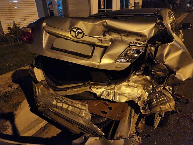 A car in Coolum was found damaged after a hit-and-run, with the driver allegedly fleeing the scene. Photo: Lewis Jaenke