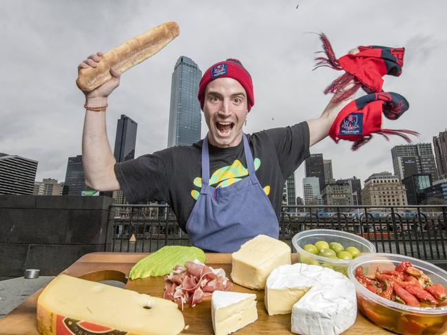 Ned Trumble, a Melbourne Demons footy supporter from Fitzroy  has gone viral after his elaborate cheese platter was snapped at the AFL over the weekend. Ned  pictured in Southbank. Picture: Jason Edwards