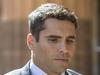 Former Crows star charged with assault on former partner
