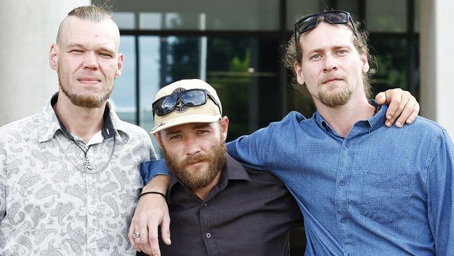 Brody Martin, Brendan Levis and Jesse Martin leave the Cairns District Court after pleading guilty to going in the with intent to intimidate and threatened to enter a dwelling. Picture: Brendan Radke