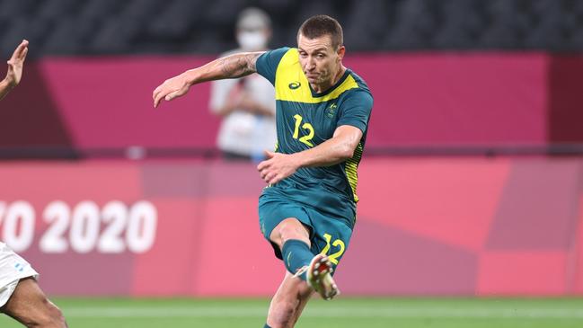 SAPPORO, JAPAN - JULY 22: Mitch Duke #12 of Team Australia shoots during the Men's First Round Group C match between Argentina and Australia during the Tokyo 2020 Olympic Games at Sapporo Dome on July 22, 2021 in Sapporo, Hokkaido, Japan. (Photo by Masashi Hara/Getty Images)