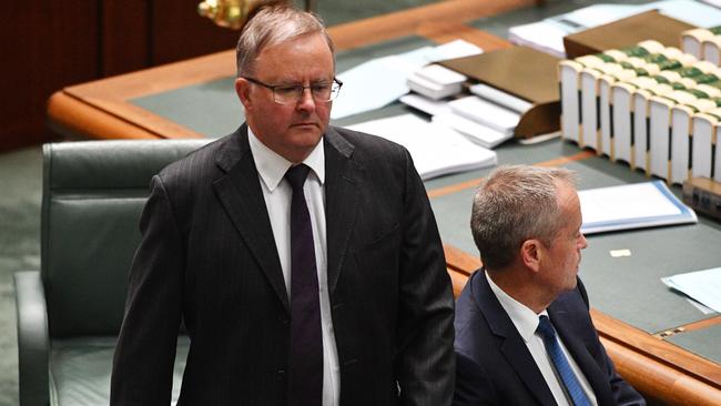 Anthony Albanese walks past Bill Shorten in parliament yesterday. Picture: AAP