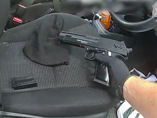 Police body worn camera footage showing a gel blaster which was found in a white Toyota Yaris being driven by a 47-year-old Masig Island man.