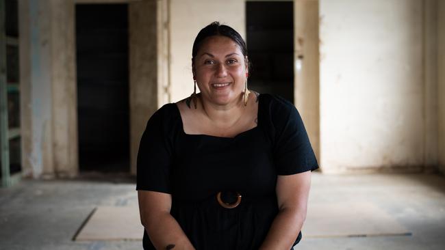 General manager of the Koori Mail Naomi Moran in her old office in Lismore. Months on from the flood, the building remains a construction zone. Picture: Elise Derwin