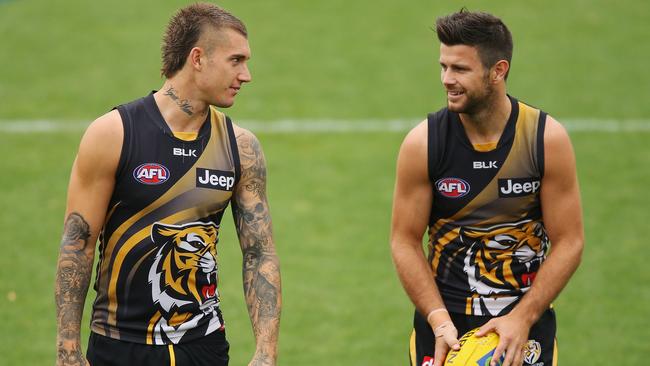 MELBOURNE, AUSTRALIA - FEBRUARY 17: Dustin Martin of the Tigers and Trent Cotchin (R) talk during a Richmond Tigers AFL media session at Punt Road Oval on February 17, 2016 in Melbourne, Australia. (Photo by Michael Dodge/Getty Images)