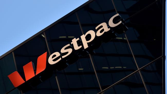 The Westpac sign is seen at their banking headquarters in Sydney on May 8, 2017.  Australian banking heavyweight Westpac posted a six percent rise in interim net profit to 2.89 billion USD on May 8, 2017 on the back of a strong performance from institutional operations. / AFP PHOTO / PETER PARKS
