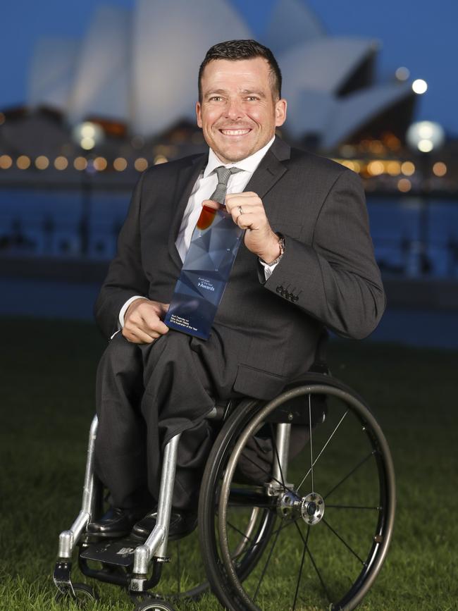 Kurt Fearnley proudly holds his award for NSW Australian of the Year. Picture: Salty Dingo