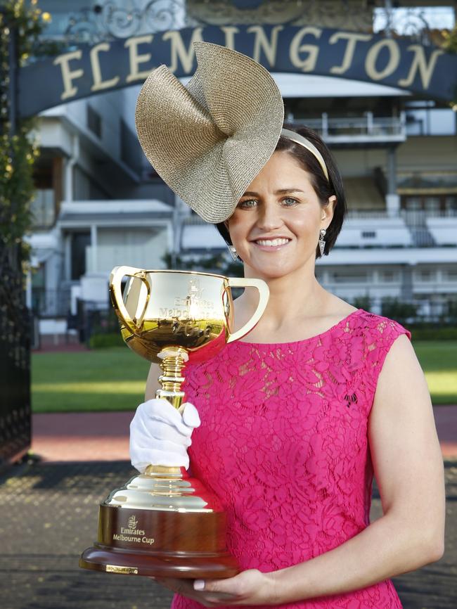 Michelle Payne with the Melbourne Cup trophy at Flemington. Picture: David Caird