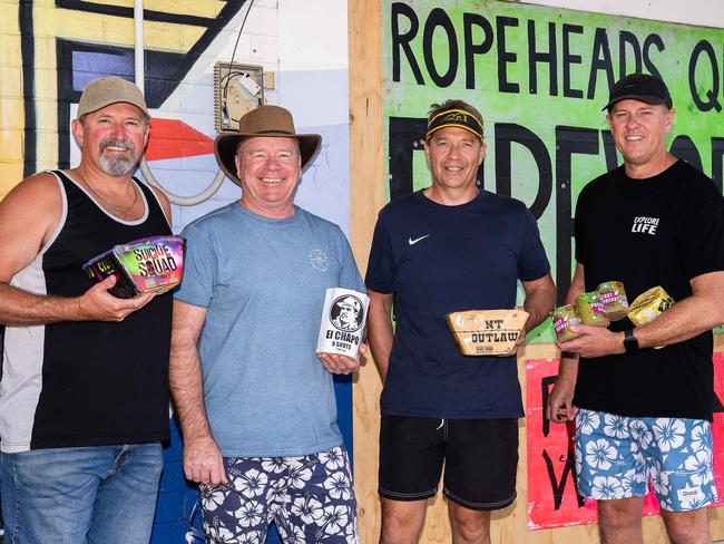 Perth mates Steve Spalding, Brett Gilchrist, Cameron Watson and Adrian Jefferson stocked up with fireworks ahead of an explosive night of fun on Territory Day. Picture: Pema Tamang Pakhrin