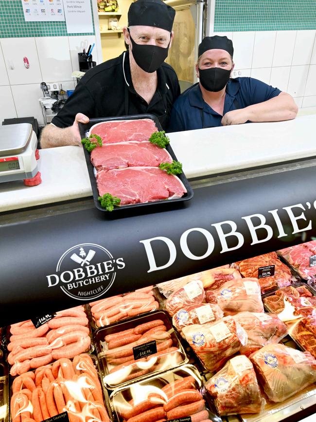 Dobbie’s Butchery owners Richard and Rachael with there fully stocked cabinet. Picture: Julianne Osborne