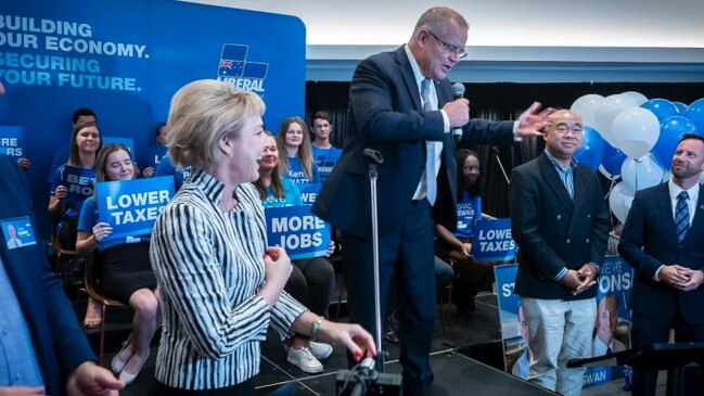 Higgins, back left, at an event featuring Scott Morrison and Michaelia Cash.