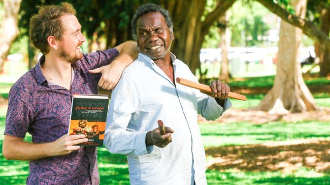 Author Matt Garrick and Yothu Yindi co-founder Wityana Marika are in town for the launch of the band’s authorised biography Writing in The Sand. Picture: Glenn Campbell