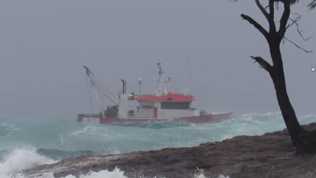 A trawler in wild seas near North Stradbroke Island. Picture: David May