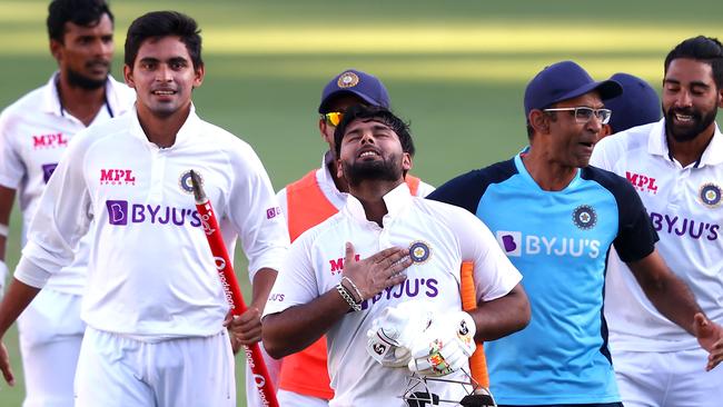 Rishabh Pant celebrates with his teammates after steering his team to victory at the Gabba Picture: AFP