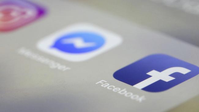 Facebook, Messenger and Instagram apps are are displayed on an iPhone on Wednesday, March 13, 2019, in New York. Facebook says it is aware of outages on its platforms including Facebook, Messenger and Instagram and is working to resolve the issue. (AP Photo/Jenny Kane)