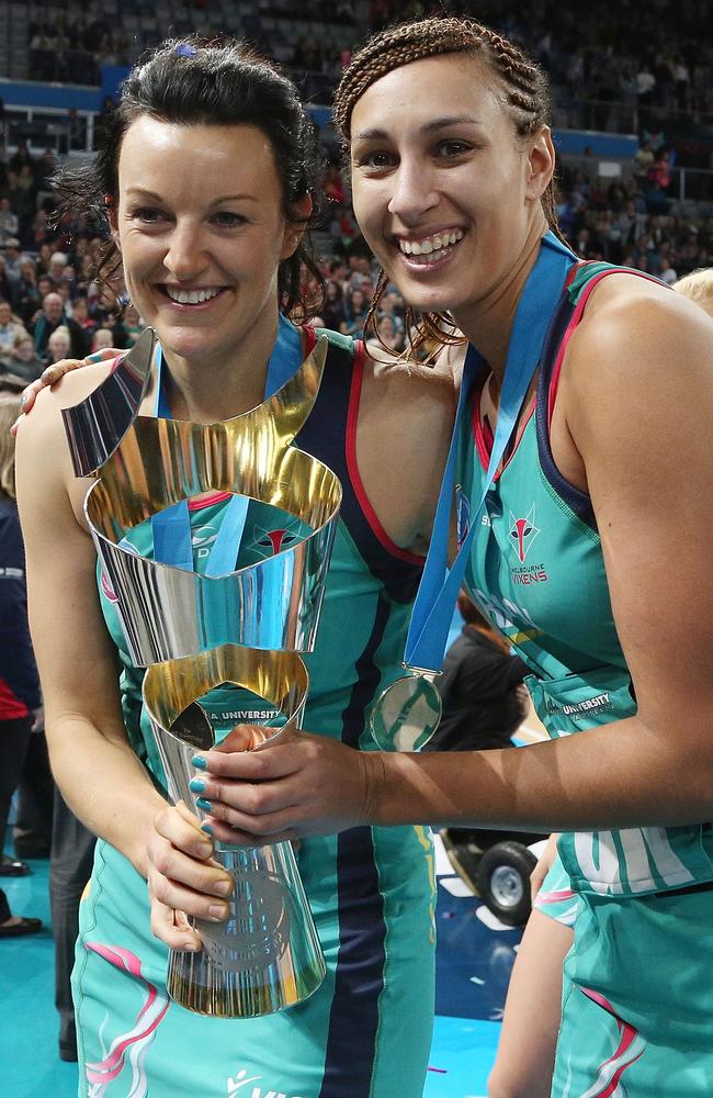 Bianca Chatfield (L) and Geva Mentor hold the trophy following victory in the 2014 ANZ Championship Grand Final. Picture: Graham Denholm/Getty Images