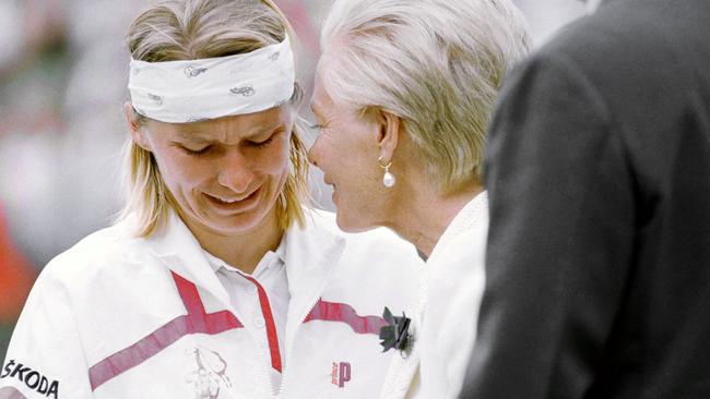 In this July 3, 1993 file photo, Jana Novotna breaks down and weeps, as she accepts the loser's plate from the Duchess of Kent following the Ladies' Singles Final on the Centre Court at Wimbledon, London. Photo: AP