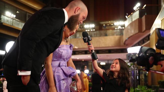 MELBOURNE, AUSTRALIA - SEPTEMBER 23: Max Gawn of the Demons is interviewed by Isla Roscrow 2018 NAB Auskicker of the Year ahead of the 2019 Brownlow Medal at Crown Palladium on September 23, 2019 in Melbourne, Australia. (Photo by Kelly Defina/AFL Photos/via Getty Images)