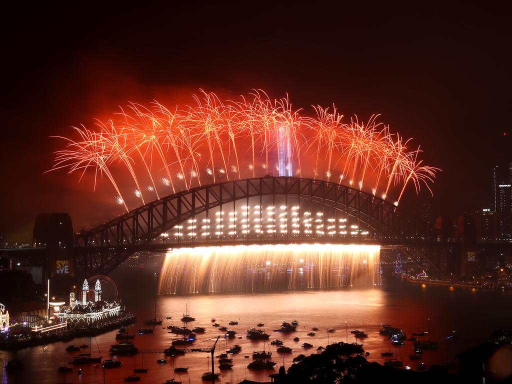 Fireworks light up the sky above Sydney Harbour during the midnight fireworks display during New Year's Eve celebrations on January 1st, 2020 in Sydney, Australia. (Photo by Cameron Spencer/Getty Images)