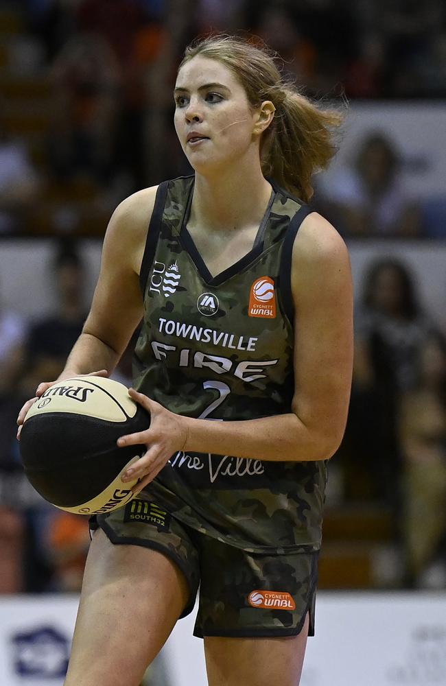 Saffron Shiels of the Fire looks to pass the ball during the WNBL match between Townsville Fire and Bendigo Spirit at Townsville Entertainment Centre, on February 18, 2024, in Townsville, Australia. (Photo by Ian Hitchcock/Getty Images)