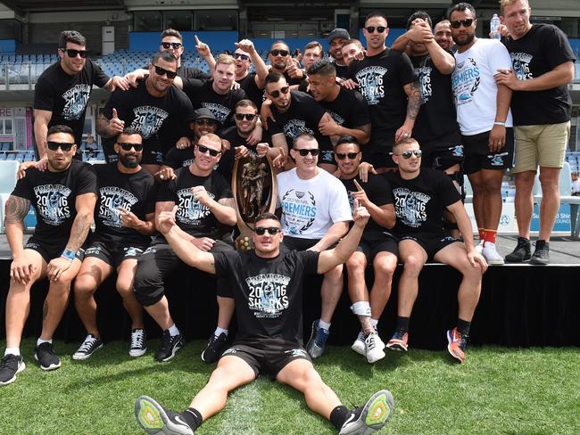 Cronulla players don’t tire of showing off the trophy. Picture: Gregg Porteous