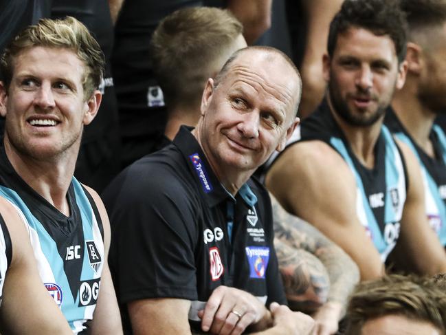 AFL - Port Adelaide Photo Day at Alberton Oval. Tom Jonas and Ken Hinkley looking around while waiting for the official team photo to be taken Picture SARAH REED