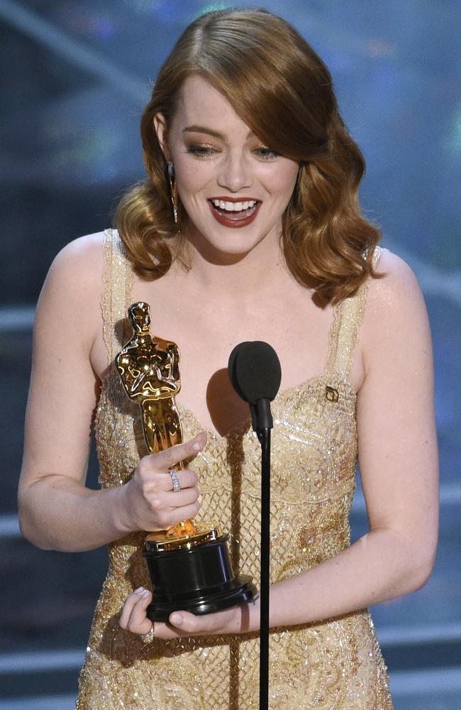 Emma Stone accepts the award for Best Actress in a leading role. Picture: Chris Pizzello/Invision/AP