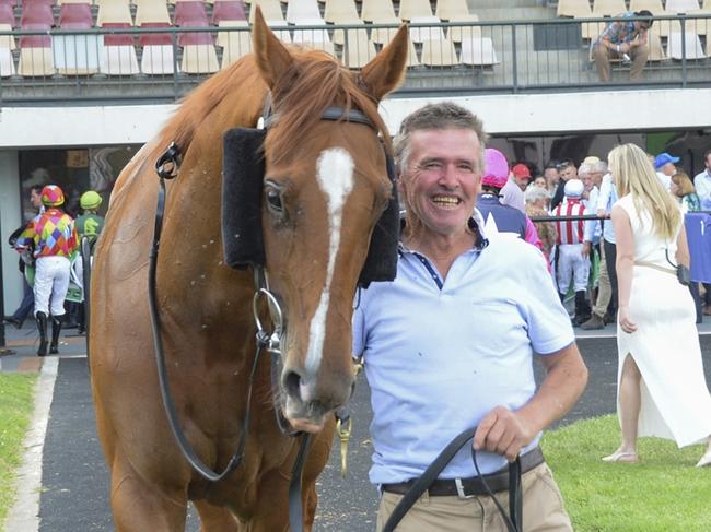 Race 8 - Canberra, 24 November 2024, Winner Mountain Chatter with trainer John Nisbet. Picture: Bradley Photos