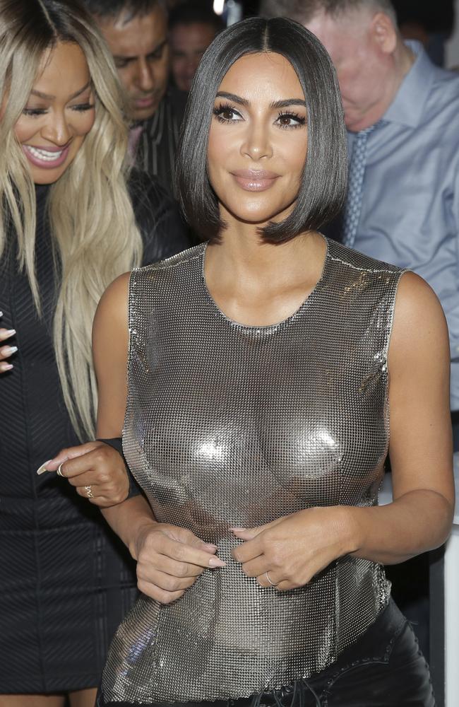 Glittering in silver, Kim Kardashian made a surprise return to NYFW. Picture: AP