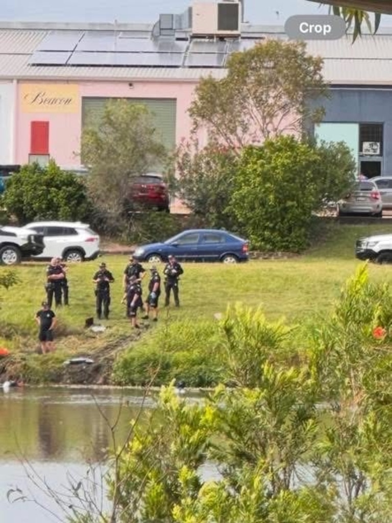 Police at the scene of an incident in Pialba after a vehicle was submerged. Photo: Tamarra Irish