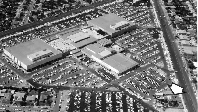 Marion from the air in 1975. The white arrows points to the isolated house.