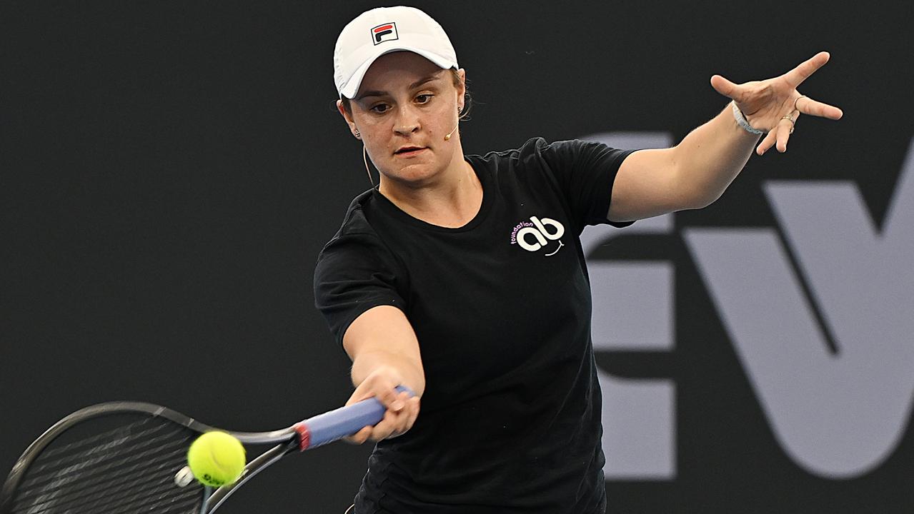 Ash Barty and Pat Rafter play doubles. Photo: Lyndon Mechielsen/Courier Mail.