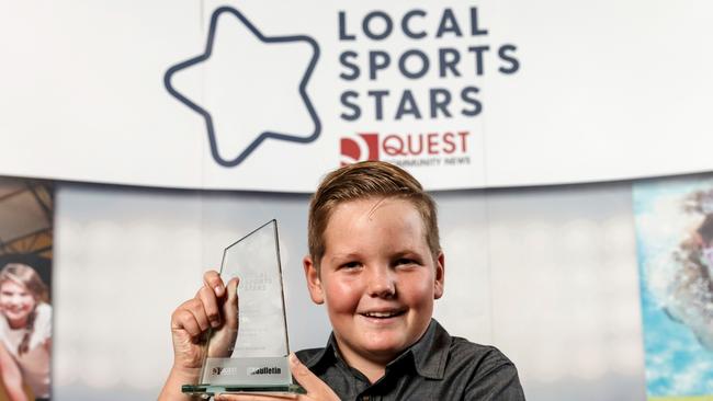 Lochie Barwick with his award from last year.