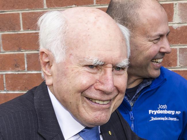 17/05/22 Former prime minister John Howard campaigning with treasurer Josh Frydenberg in the federal seat of Kooyong. Aaron Francis / The Australian